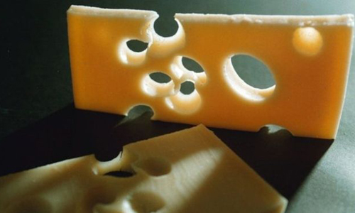 Why do cheese have holes?