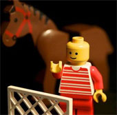 Why do Lego toys have holes in their heads?