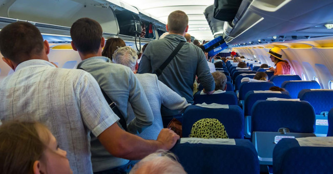 Why do passengers have to wait long before leaving the plane?