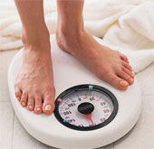 Why do people in the morning weigh less than the evening?