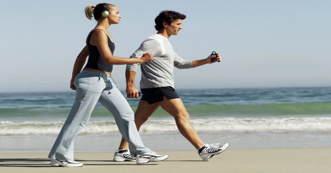 Why do people swing their hands when walking?