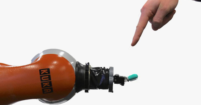Why do scientists want to teach robots to feel pain?