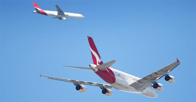Why do so many planes fly in the sky at the same time and never touch each other?