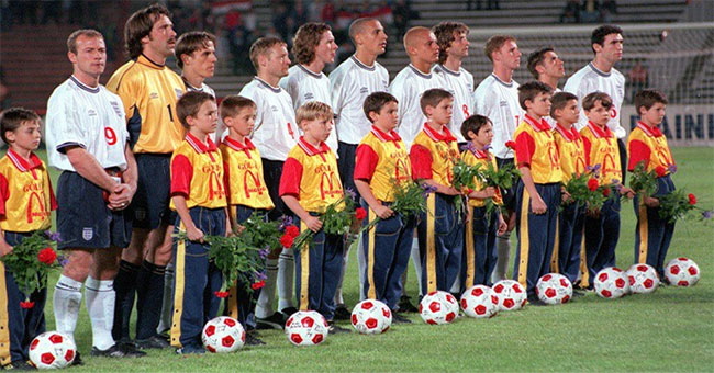 Why do soccer players always walk out to the yard with children?