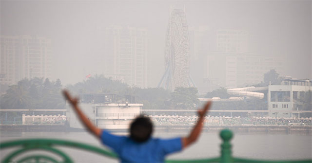 Why does air pollution occur when people are sleeping?
