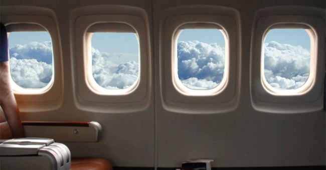 Why does the plane window have a small hole?