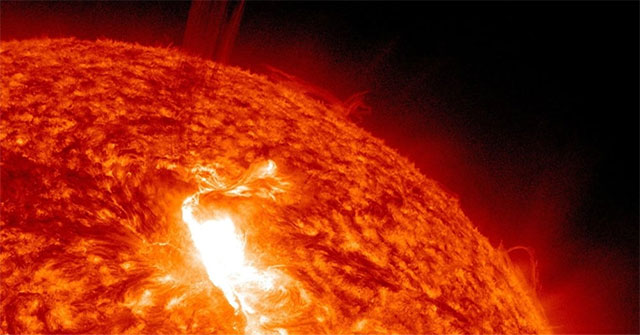 Why does the Sun give off a terrible heat but is the space still cold?