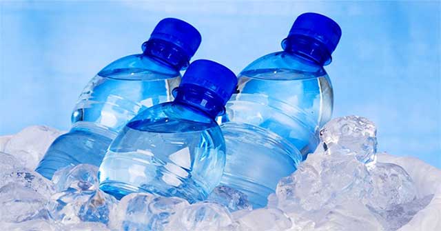 Why doesn't the water freeze all at once and freeze from the top down?