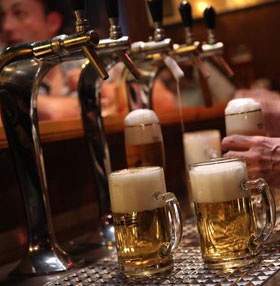 Why is beer harder to overflow than coffee?