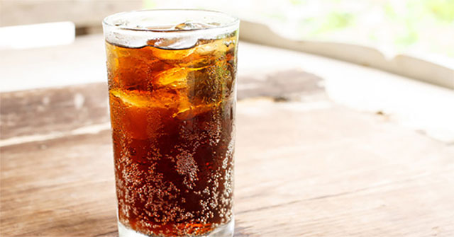 Why is carbonated water poured into the cup when it is poured?