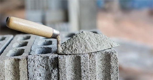 Why is cement a powder but when mixed with water, it is as hard as stone?