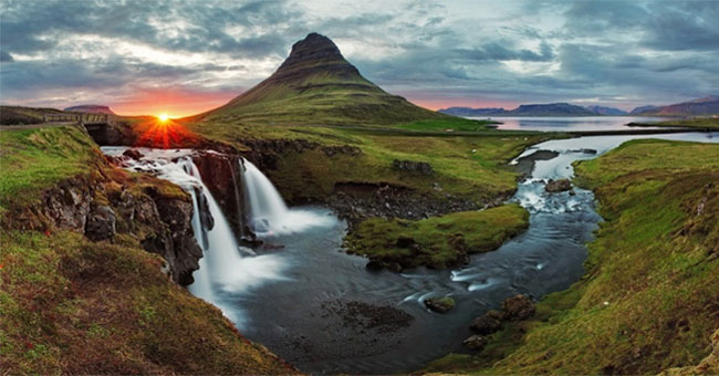 Why is Greenland full of ice, while Iceland is covered with greenery?