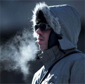 Why is it cold when we breathe out smoke?