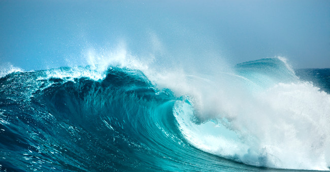 Why is the sea still calm and still have waves?