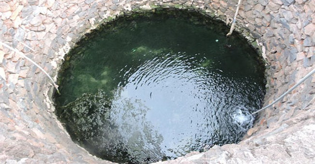 Why is warm well water in winter, cool in summer?