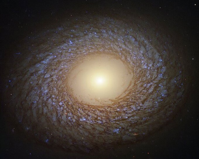 The spiral galaxy is 80,000 light-years across Picture 1
