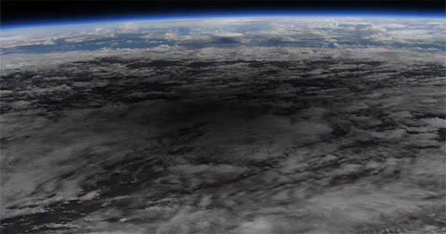 Astronaut taking eclipse of the Earth from the ISS Space Station