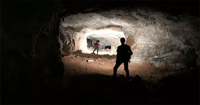 Discover the mysterious mine system beneath the deep hole of death in the middle of the neighborhood