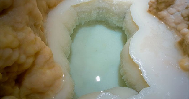 Jade-green lake inside strange cave in America