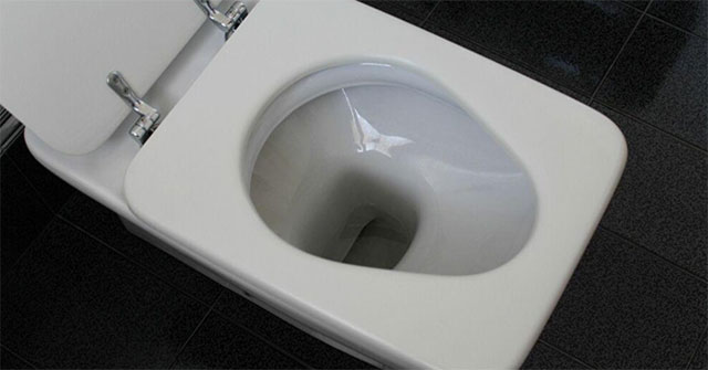 Toilet with buttocks, warning of health condition