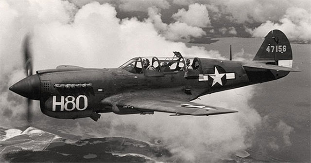 Why do pilots shoot guns without dangling the rotor blades?