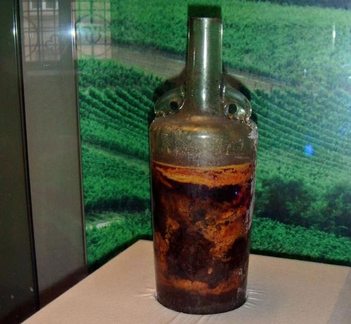 Picture 1 of 1,700-year-old wine bottle found in ancient tomb, expert says it may still be drinkable