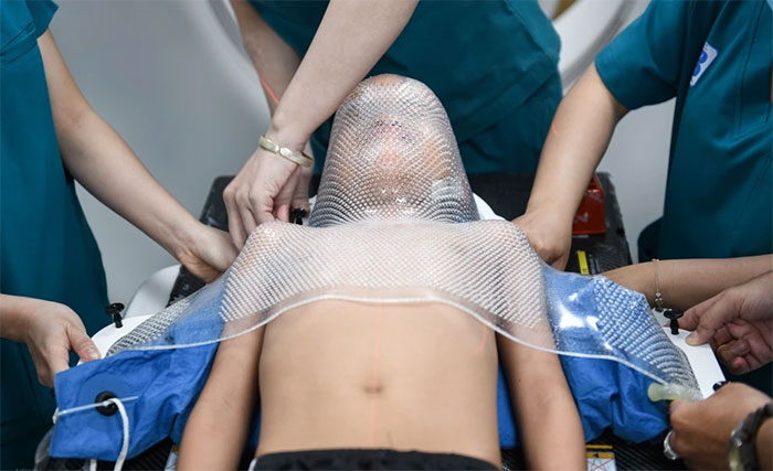 Picture 4 of Close-up of the process of 'making' cancer radiation therapy masks