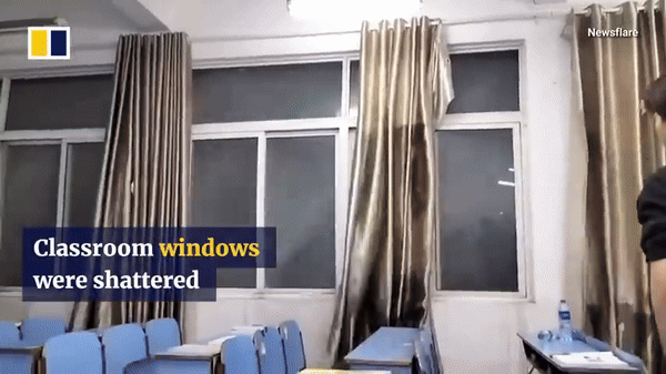 Picture 2 of Hail, deadly gusts of wind in China: Apartment and dormitory windows were torn apart, creating a horrifying scene
