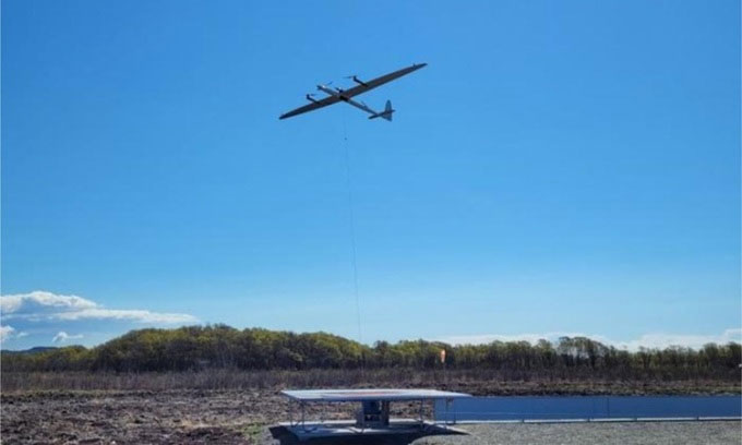 Picture 1 of He sought to produce wind power using drones