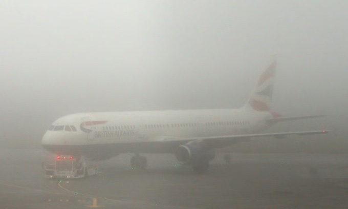 Picture 1 of How do planes operate in thick fog?