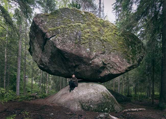 Strangely, the giant rock lay precariously as if it was about to roll but kept pushing and not falling Picture 2