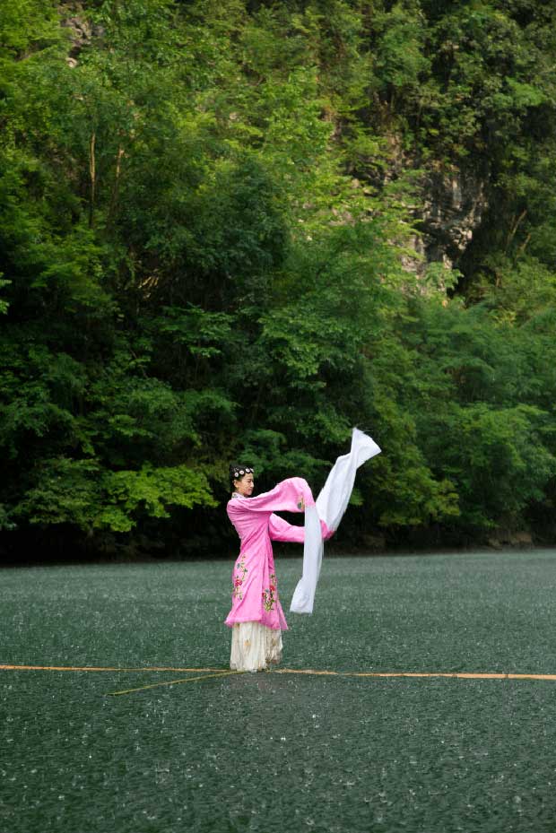 The girl possesses a nearly lost 'water-surfing' technique, performing on the river like something out of a martial arts movie. Picture 7