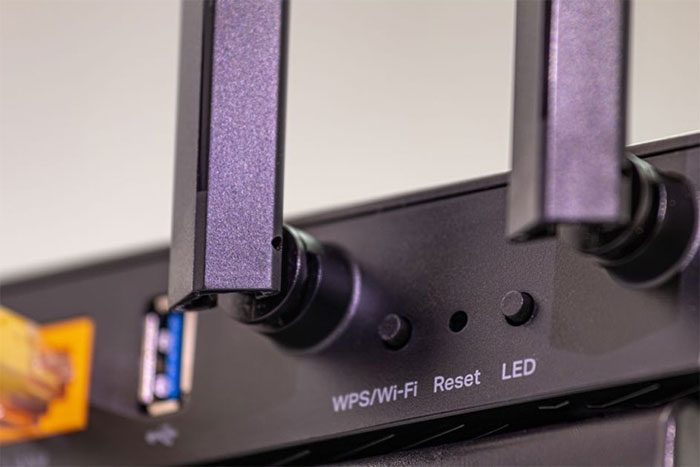 Picture 3 of What is the WPS button on the router for?