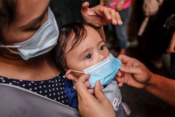 Picture 1 of WHO issues new recommendations on wearing masks to protect against coronavirus