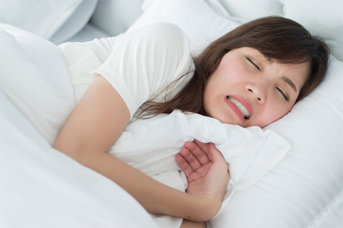 Picture 1 of Why many people grind their teeth while sleeping