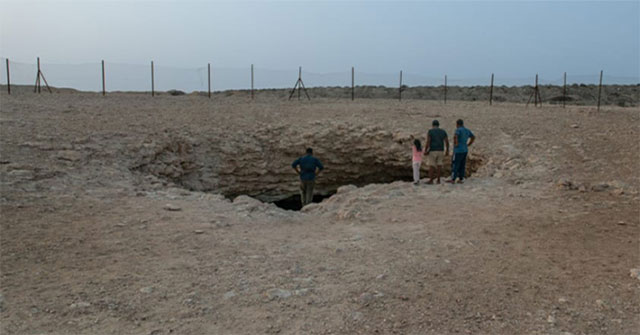 100m deep sinkhole in the desert in Qatar