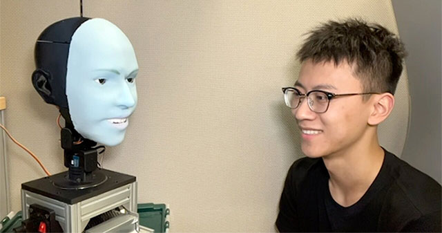 AI robot predicts and smiles at the same time as the other person