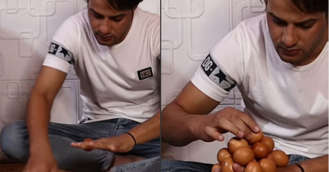 Balancing 18 eggs on the back of his hand, the man sets a world record