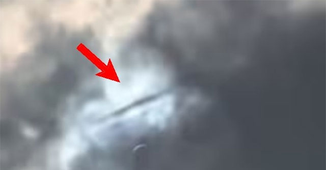 Captured the image of a 'flying saucer' passing by and then disappearing right at the time of the total solar eclipse