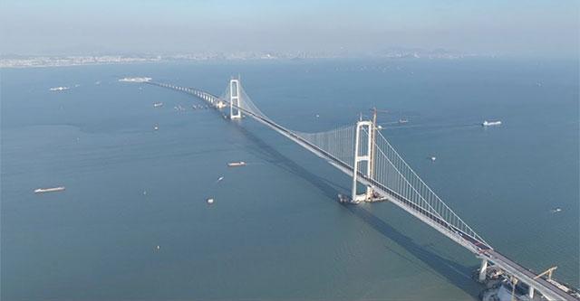 China's $6.7 billion cross-sea bridge mega project sets world record for paving in just one day