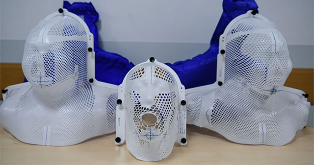 Close-up of the process of 'making' cancer radiation therapy masks