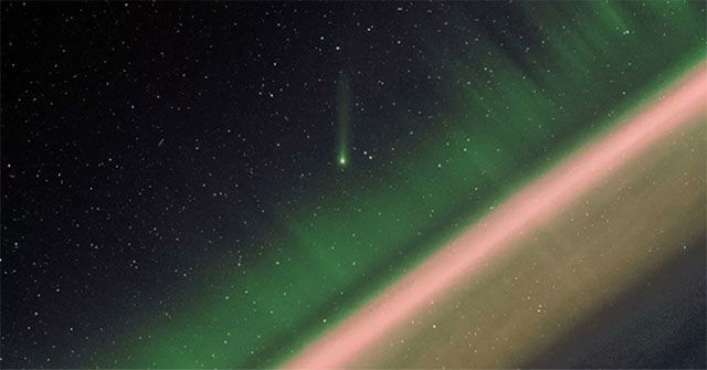 Comet shines above the aurora seen from space