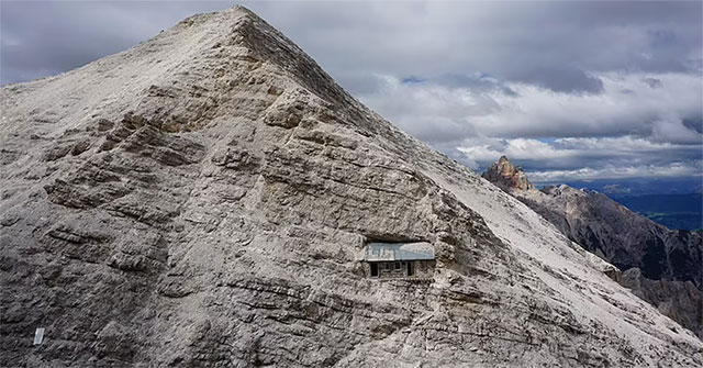 Discover a unique old house hidden in a mountain