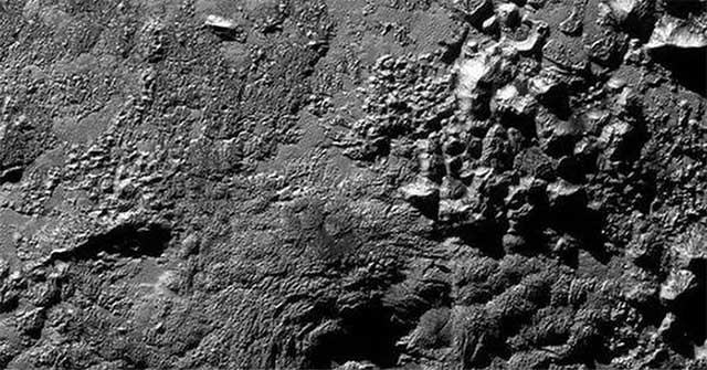 Giant ice volcanoes appear on Pluto, possibly with life