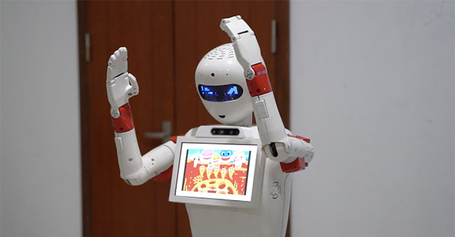 Military school instructors build robots that can dance and sing and teach English