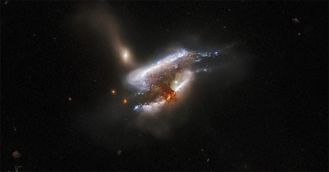 Photograph of a merging galaxy 681 million light-years away