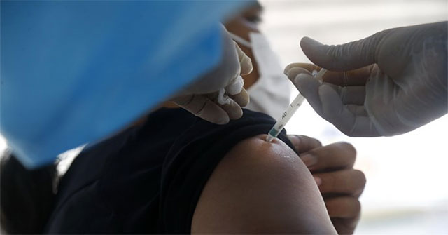 Prolonged fever after vaccination may be a symptom of SARS-CoV infection