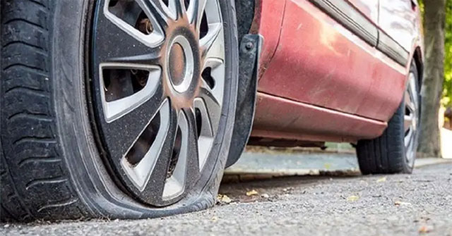 Should you continue driving when your car has a punctured tire?