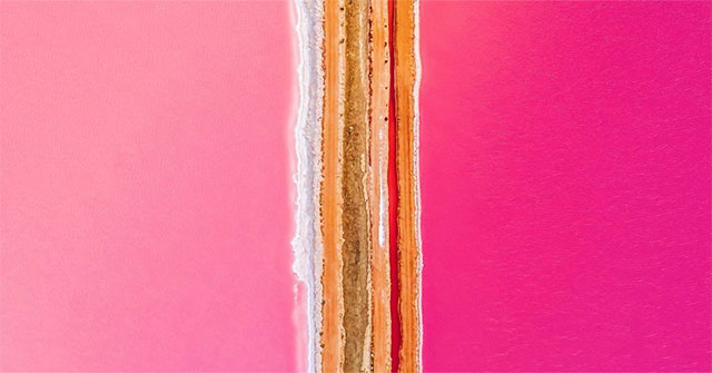 Strange pink, red, orange lake by the hour