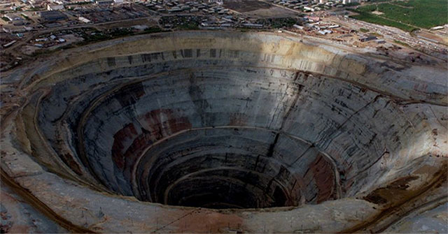 The huge diamond mine is deep, sucking everything that flies past it including helicopters, small planes